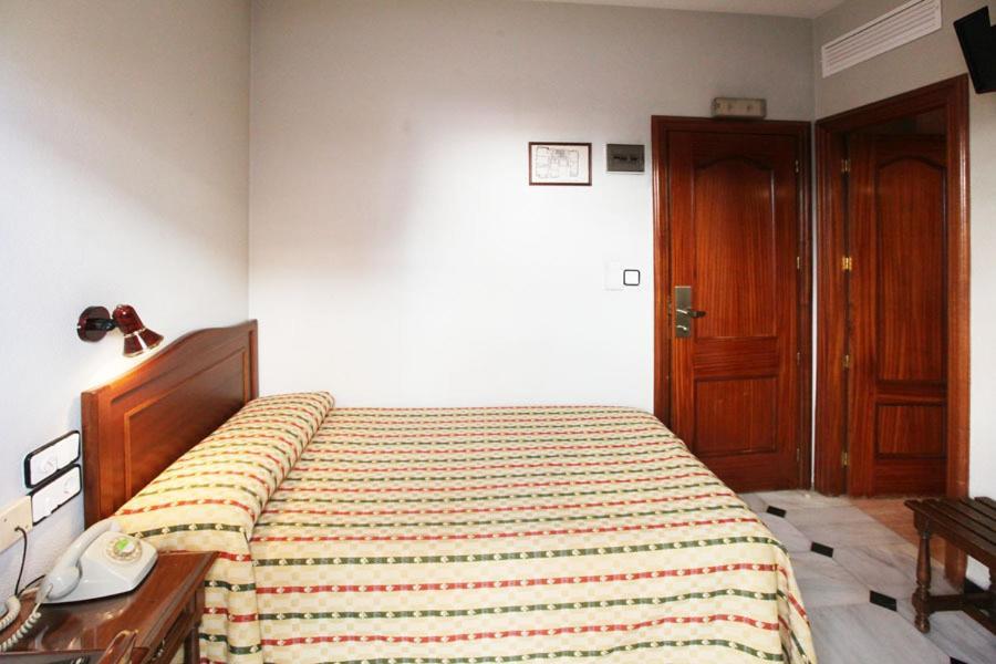 Hotel El Cisne à Cordoue Chambre photo