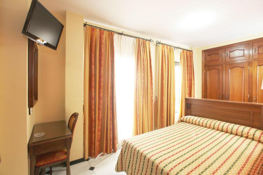 Hotel El Cisne à Cordoue Chambre photo